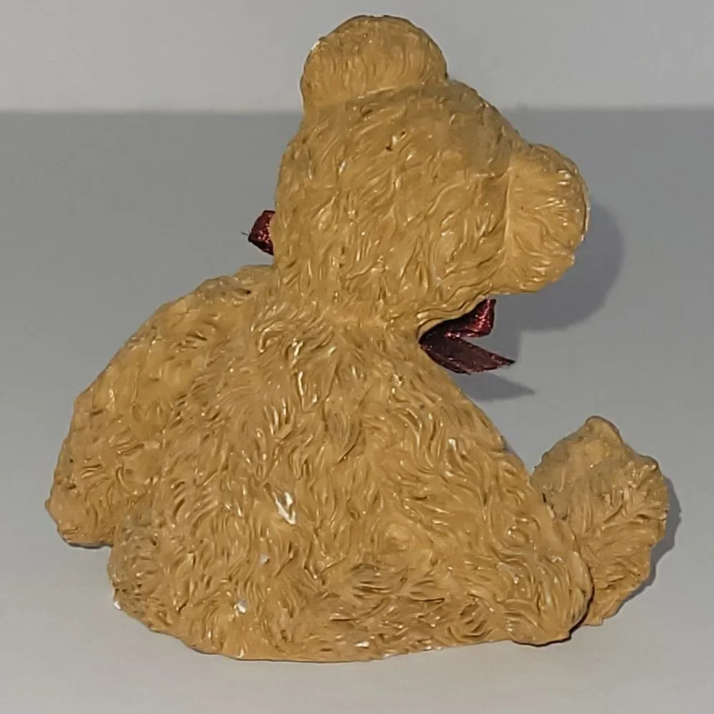 Small Decorative Brown Teddy Bear Figurine with Red Bow